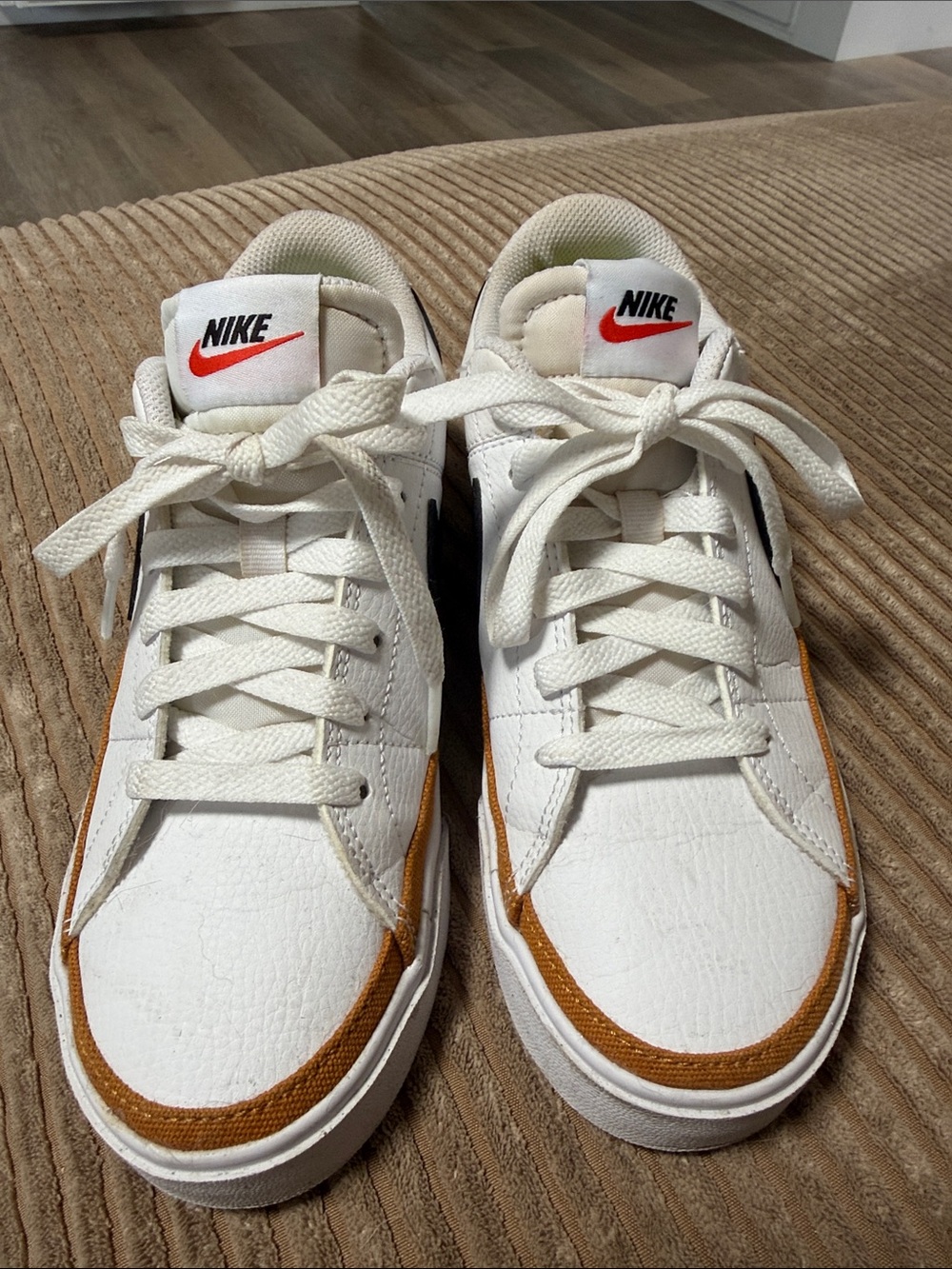 Nike Men’s White Sneakers with Tan Trim and Red Swoosh